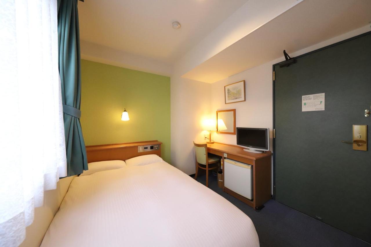 Smile Hotel Takaoka Ekimae Extérieur photo